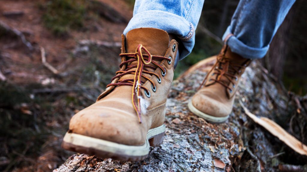 Boots walking on a log